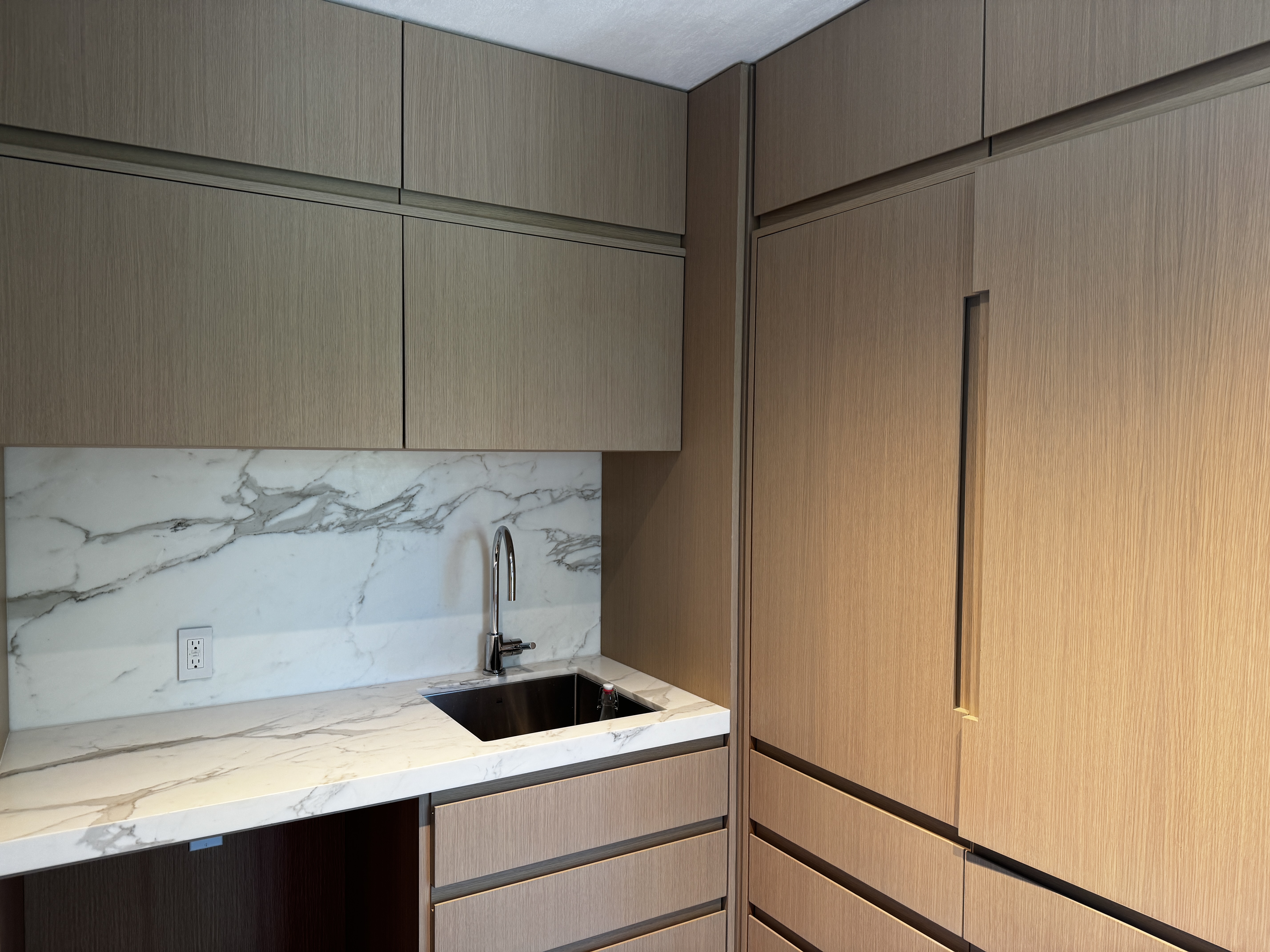 Butler's Pantry with Marble Backsplash